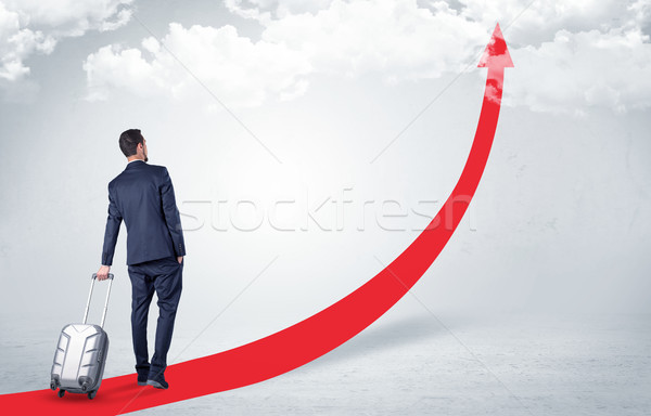 Businessman leaving on the red carpet arrow Stock photo © ra2studio