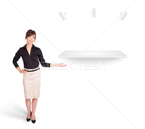 Beutiful young woman presenting modern copy space Stock photo © ra2studio