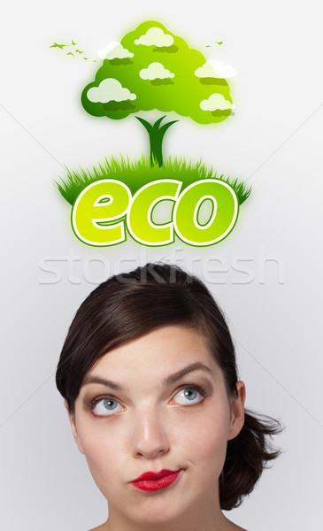 [[stock_photo]]: Jeune · fille · regarder · vert · eco · signe · tête