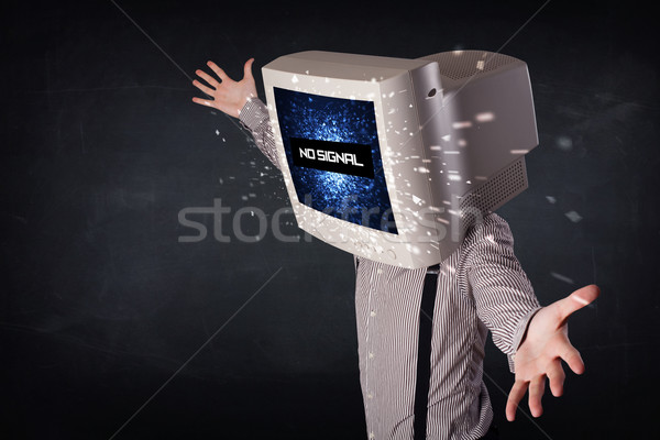 Man with a monitor head, no signal sign on the display Stock photo © ra2studio