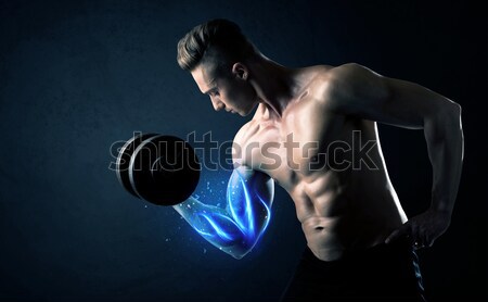 Bodybuilder Heben Gewicht energetische weiß Zeilen Stock foto © ra2studio