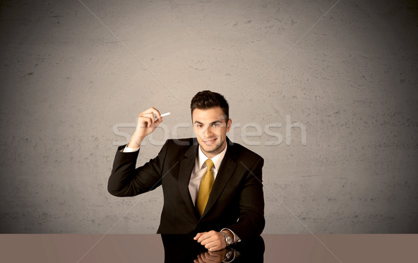 Elegant person drawing in empty space Stock photo © ra2studio