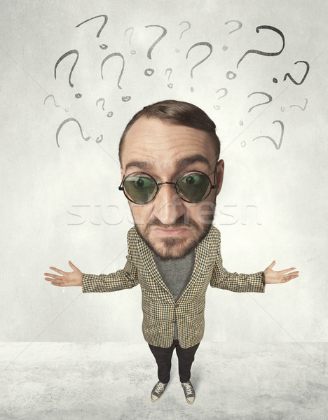 Big head person with question marks Stock photo © ra2studio