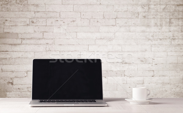 Business laptop with white brick wall Stock photo © ra2studio