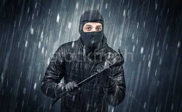Caught burglar by house camera in action. Stock photo © ra2studio