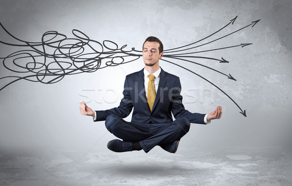 Businessman meditates with purifying doodle concept Stock photo © ra2studio