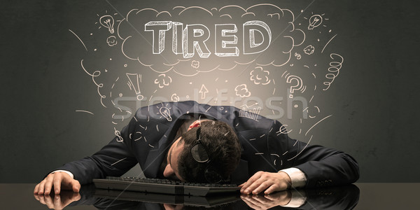 Businessman fell asleep at his workplace with ideas, sleep and t Stock photo © ra2studio