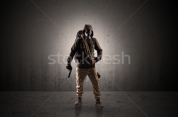 Agent in a dark space with arms Stock photo © ra2studio