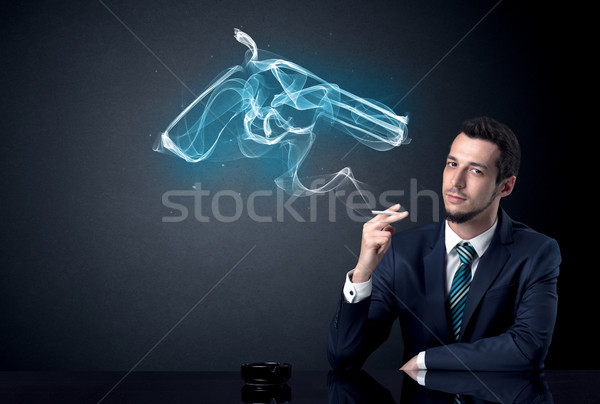 Stock photo: Businessman smoking concept