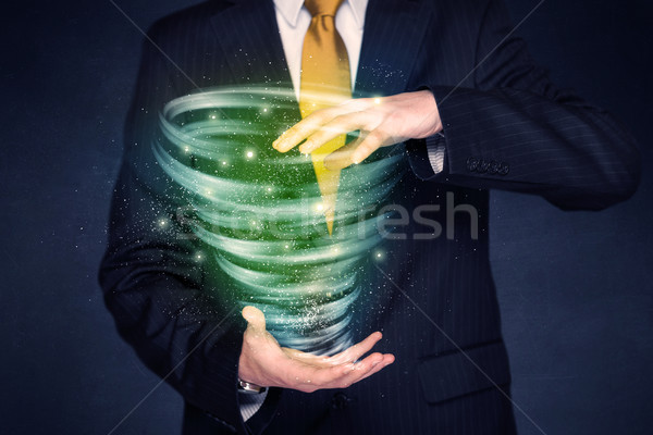 Geschäftsmann halten grünen Tornado hellen Hände Stock foto © ra2studio