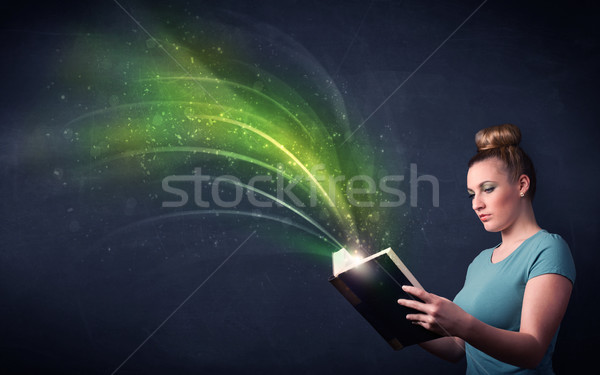 Fiatal hölgy tart könyv hullám lezser Stock fotó © ra2studio