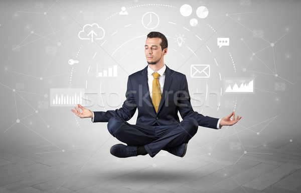 Stock photo: Businessman levitates with data circulation concept