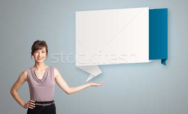 woman presenting modern origami copy space Stock photo © ra2studio