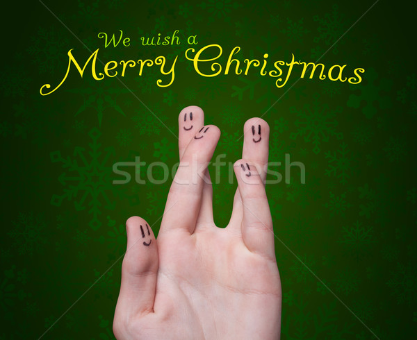 Stock photo: Happy group of finger smileys with merry christmas sign 