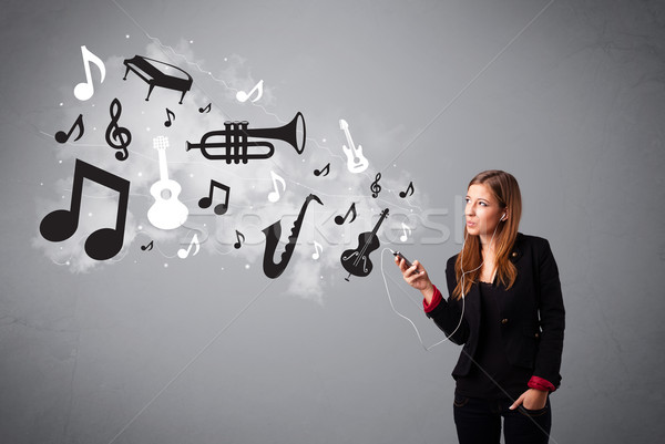 Beautiful young woman singing and listening to music with musical notes and instruments Stock photo © ra2studio