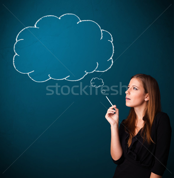 Stock photo: Beautiful lady smoking cigarette with idea cloud