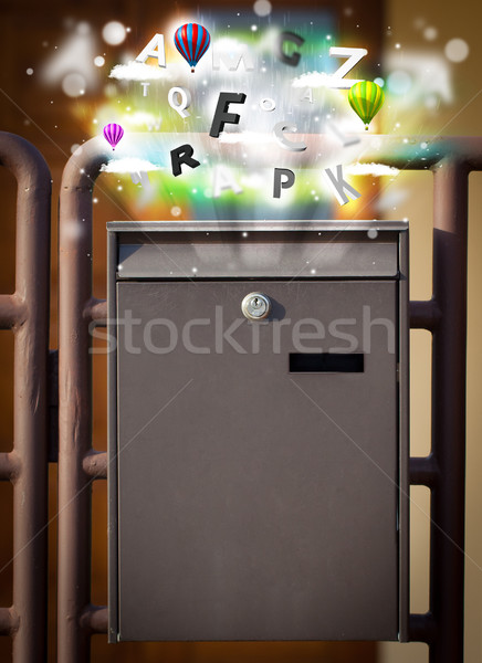 Stock photo: Post box with colorful letters