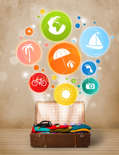 Suitcase with colorful summer icons and symbols Stock photo © ra2studio