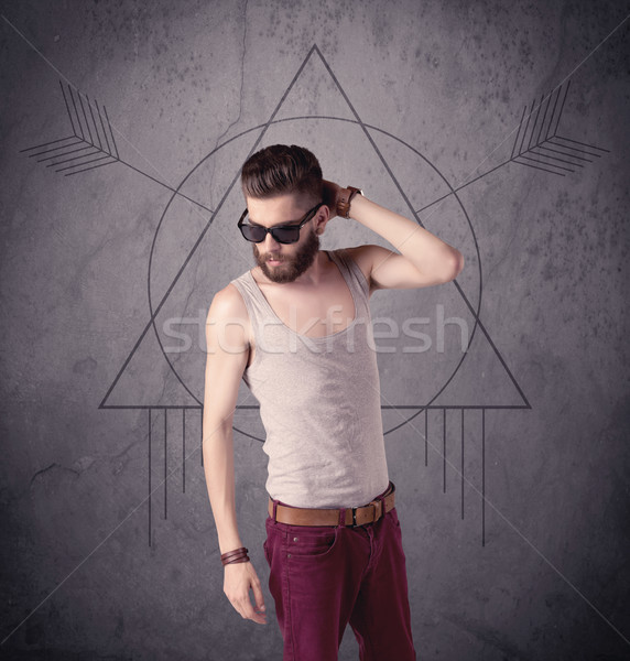 Casual funny male using mobile phone Stock photo © ra2studio