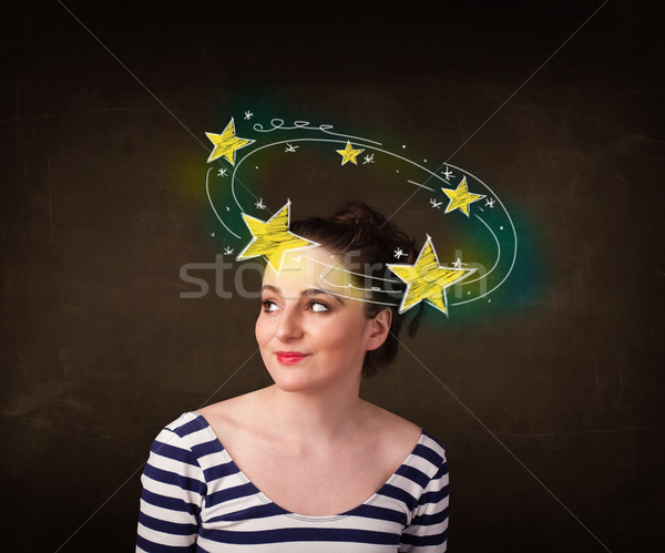 girl with yellow stars circleing around her head illustration Stock photo © ra2studio