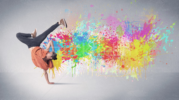 Young colorful street dancer with paint splash Stock photo © ra2studio