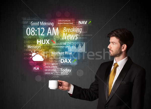 Businessman holding a white cup with daily news and information Stock photo © ra2studio