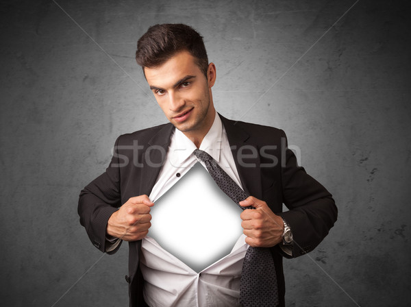 Businessman tearing off his shirt with white copyspace on chest Stock photo © ra2studio