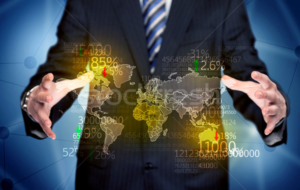 Business person holding earth statistics map Stock photo © ra2studio