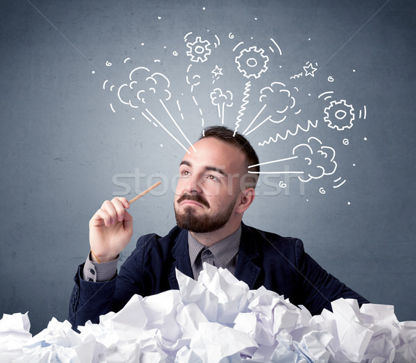 Businessman behind crumpled paper Stock photo © ra2studio