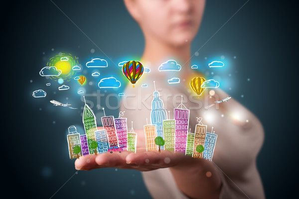 Young woman presenting colorful hand drawn metropolitan city Stock photo © ra2studio