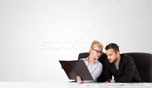 Businessman and businesswoman with plain white copy space Stock photo © ra2studio