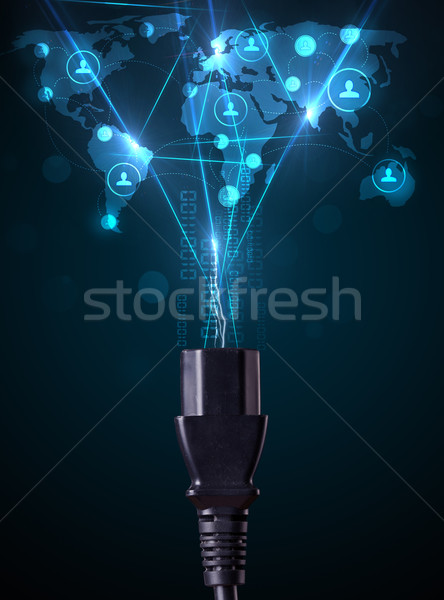 Stock photo: Social network icons coming out of electric cable
