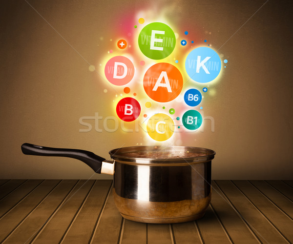 Colorido vitaminas fora panela alimentação saudável metal Foto stock © ra2studio