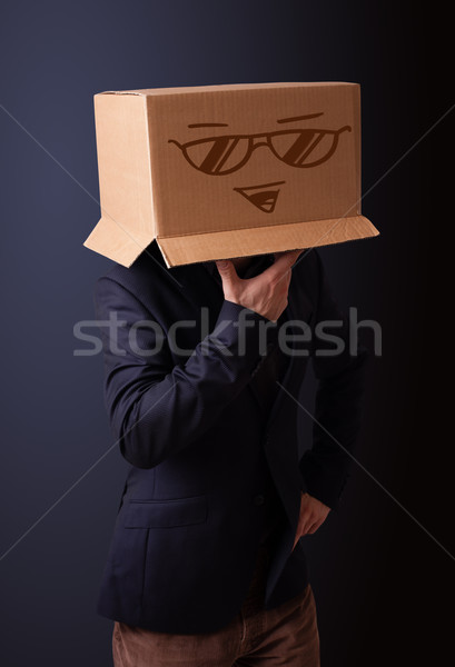 Młody człowiek karton głowie stałego Zdjęcia stock © ra2studio