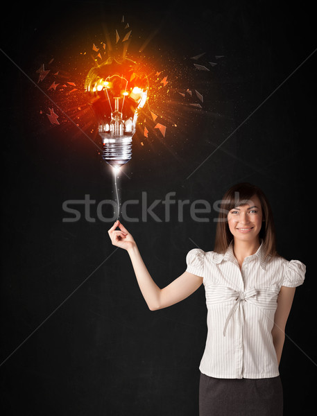 üzletasszony robbanás villanykörte fekete üzlet lány Stock fotó © ra2studio