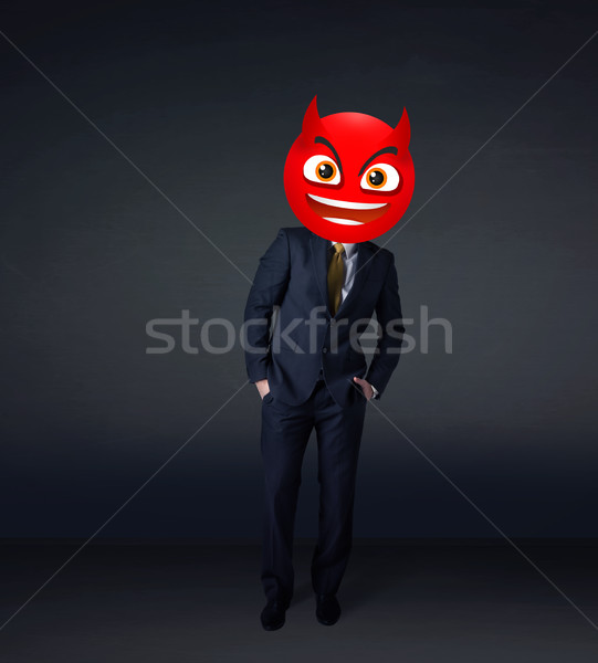 businessman wears devil smiley face Stock photo © ra2studio