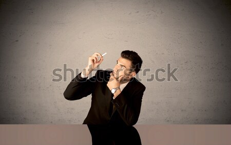 Elegant person drawing in empty space Stock photo © ra2studio