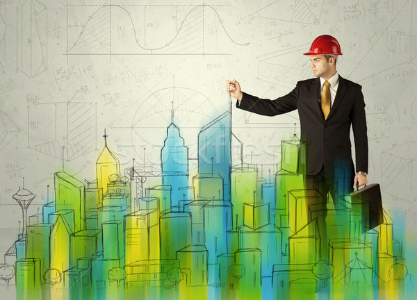 Stock photo: Business architect sketching a cityscape