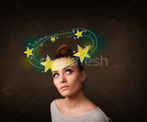 girl with yellow stars circleing around her head illustration Stock photo © ra2studio