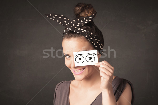 Funny woman looking with hand drawn paper eyes Stock photo © ra2studio