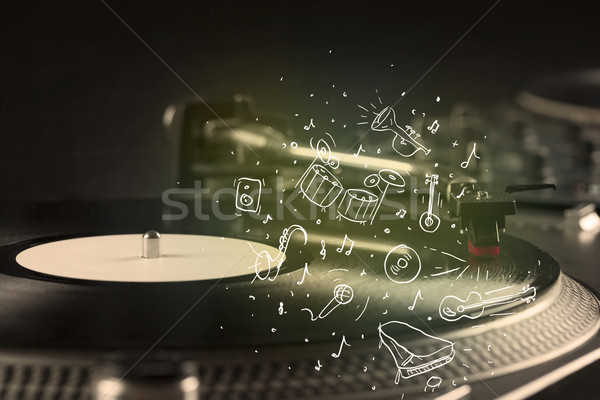 Turntable playing classical music with icon drawn instruments  Stock photo © ra2studio