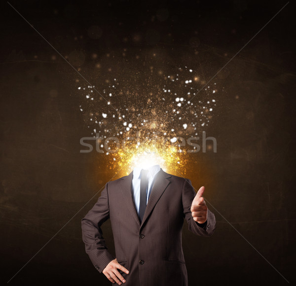 Business man with glowing exploding head Stock photo © ra2studio