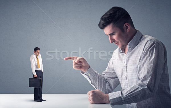 Fiatal üzletember harcol miniatűr profi mérges Stock fotó © ra2studio