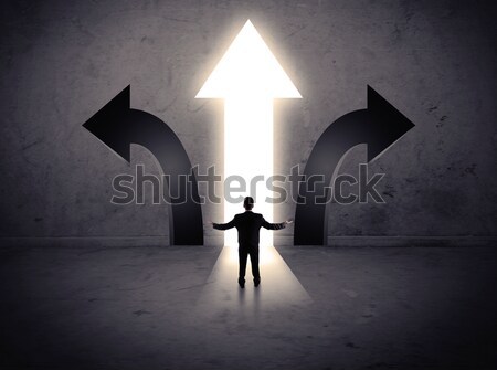 Businessman standing in front of a strong hero vision Stock photo © ra2studio