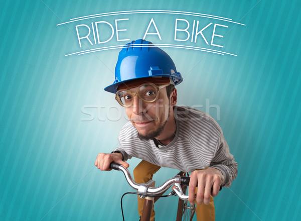 Nutty cyclist on his bike Stock photo © ra2studio
