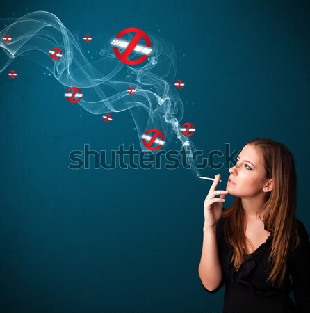 Young woman smoking dangerous cigarette with no smoking signs Stock photo © ra2studio