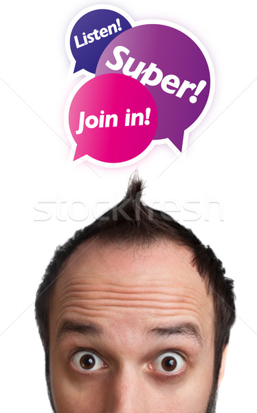 Young man with Join in sign over his head Stock photo © ra2studio