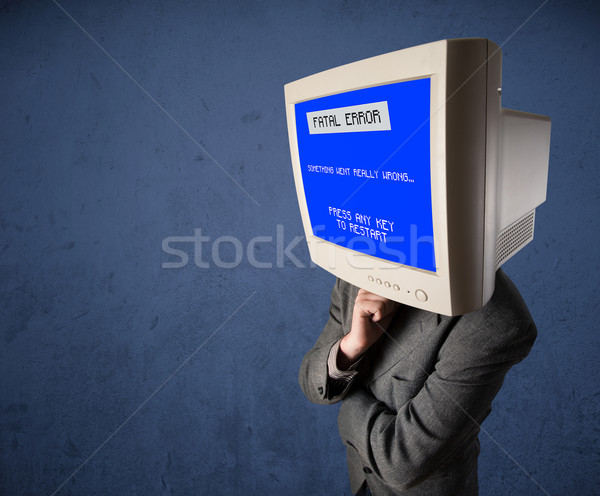 Person with a monitor head and fatal error blue screen on the di Stock photo © ra2studio