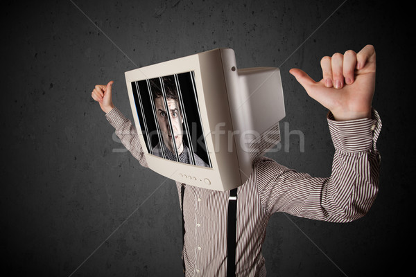 Business man with monitor on his head traped into a digital syst Stock photo © ra2studio