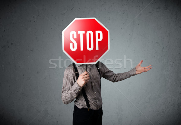 üzletember tart stoptábla áll fej kéz Stock fotó © ra2studio